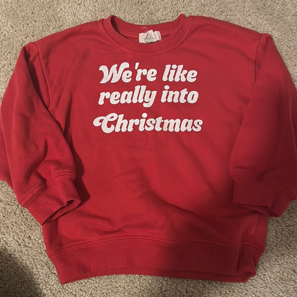 Tullabee “we’re like really into Christmas” toddler sweatshirt.